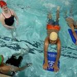 A beginner's swim class at the Lynn YMCA in June. 
