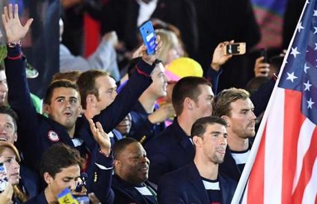 USA's flag bearer Michael Phelps led his national delegation during the opening ceremony of the Rio 2016 Olympic Games at the Maracana stadium in Rio de Janeiro on Friday. 
