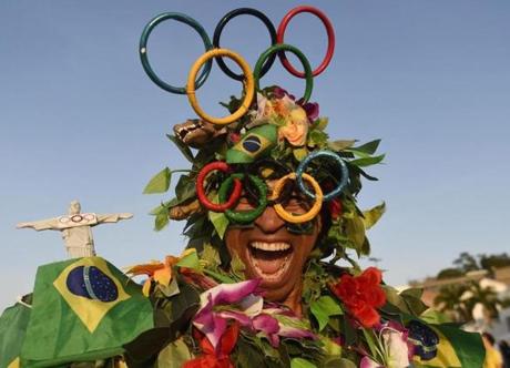 An Olympic fan smiles in the Museou do Amanha ahead of the Opening Ceremony of the Rio 2016 Olympic Games, in Rio de Janeiro Brazil, on Aug. 5.
