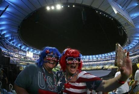 American fans take a selfie before the start of the Opening Ceremony.
