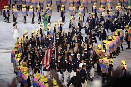 Flag bearer, Michael Phelps, arrives with the United States delegation during the Opening Ceremony of the Rio 2016 Olympic Games.
