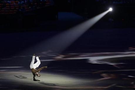 An artist performs during the opening ceremony for the 2016 Summer Olympic.
