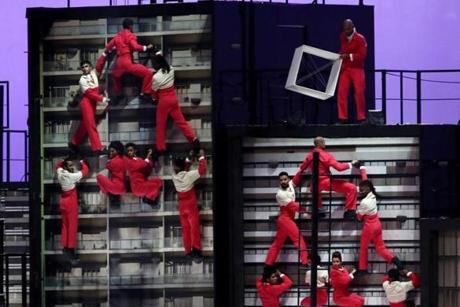 Dancers perform during the Metropolis segment of the Opening Ceremony.
