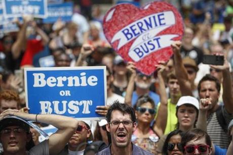 Supporters of Sen. Bernie Sanders, I-Vt., rally near City Hall in Philadelphia, Tuesday, July 26, 2016, during the second day of the Democratic National Convention. (AP Photo/John Minchillo)
