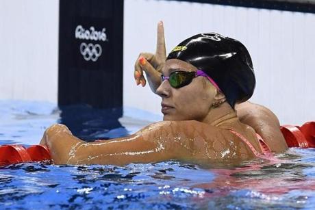 Russia's Yulia Efimova reacts after competing in the Women's 100m Breaststroke Semifinal during the swimming event at the Rio 2016 Olympic Games at the Olympic Aquatics Stadium in Rio de Janeiro on August 7, 2016. / AFP PHOTO / GABRIEL BOUYSGABRIEL BOUYS/AFP/Getty Images
