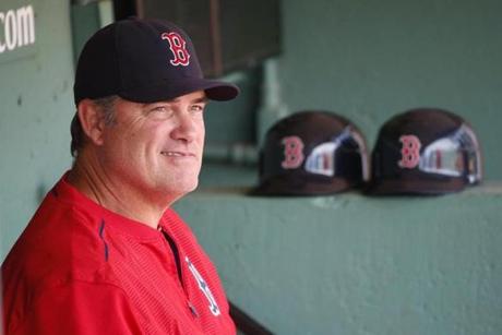 Boston Red Sox manager John Farrell sits in the dug out before a baseball game against the Minnesota Twins in Boston, Sunday, July 24, 2016. (AP Photo/Michael Dwyer)
