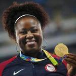 epa05482121 Michelle Carter of the USA poses with her gold medal on the podium after winning the women's Shot Put final of the Rio 2016 Olympic Games Athletics, Track and Field events at the Olympic Stadium in Rio de Janeiro, Brazil, 13 August 2016. EPA/YOAN VALAT