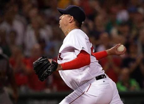 Boston, MA - 8/13/2016 - (8th inning) Boston Red Sox relief pitcher Brad Ziegler (29) came in relief with bases loaded and no outs and struck out three in the eighth inning. The Boston Red Sox take on the Arizona Diamondbacks in Game 2 of a 3 game series at Fenway Park. - (Barry Chin/Globe Staff), Section: Sports, Reporter: Peter Abraham, Topic: 14Red Sox-Diamondbacks, LOID: 8.2.3934427785.
