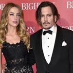 Amber Heard and Johnny Depp in January, before they split. 