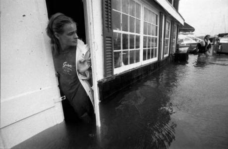 An employee watched as Eel Pond flooded into Shuckers restaurant in the Woods Hole section of Falmouth during Hurricane Bob.
