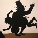 A detail from a cut-paper silhouette wall piece by Kara Walker in ?First Light? at the ICA.