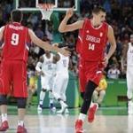 Serbia's Nikola Jokic (14) celebrates a score during a men's basketball game against the United States at the 2016 Summer Olympics in Rio de Janeiro, Brazil, Friday, Aug. 12, 2016. (AP Photo/Eric Gay)