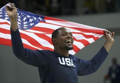 Kevin Durant celebrated his team?s gold medal victory over Serbia.
