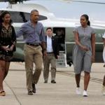 President Obama and his family prepared to board Air Force One at Air Station Cape Cod on Sunday as their 16-day summer vacation on Martha?s Vineyard drew to a close.