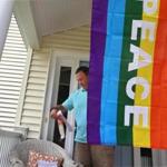 Neil Podolski was one of many Natick neighbors displaying the rainbow flag in support of Lauri and Cari Ryding. 