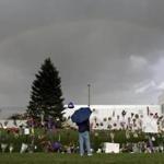 A rainbow over Paisley Park near a memorial for Prince, in Chanhassen, Minn.