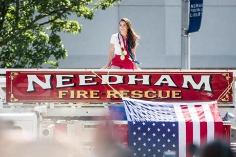 08/27/2016 NEEDHAM, MA Aly Raisman (cq) arrives on a fire truck for a rally honoring the Olympic champion gymnast in the Town Common of her hometown, Needham. (Aram Boghosian for The Boston Globe) 
