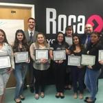 Graduates from the Roca-CVS Pharmacy Technician Training program received their certificates at Roca. a Chelsea-based nonprofit.