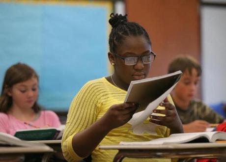 BOSTON, MA - 8/24/2016:Student Mischa McLean in Shirley Jones-Luke's class at Boston Latin, the Exam School Initiative, a program that helps fifth graders prepare for the rigorous entrance exam they must ace to get into Boston Latin School and the city's two other exam schools. (David L Ryan/Globe Staff Photo) SECTION: METRO TOPIC 28bls
