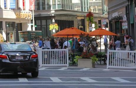  Two blocks of downtown crossing are transformed to an outdoor cafe as part of a city expirament. Franklin and Arch streets Globe photo by David Ryan
