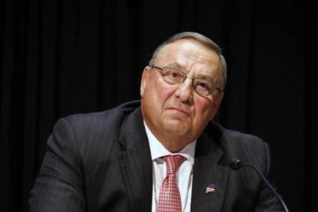 FILE- In this June 7, 2016, file photo, Maine Gov. Paul LePage attends an opioid abuse conference in Boston. LePage is being accused again of making racially insensitive comments, this time by saying photos he's collected in a binder of drug dealers arrested in the state show more than 90 percent of them are black or Hispanic. The governor made the remark at a town hall in North Berwick, Maine, Wednesday, Aug. 24, 2016. (AP Photo/Michael Dwyer, File)
