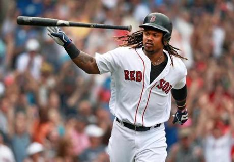 08/31/16: Boston, MA: The Red Sox Hanley Ramirez blasted a bottom of the fifth inning grand slam on the first pitch he saw, turning a 4-1 defecit into a 5-4 lead. He carried his bat with him half way down the first base line and when the ball was safely out of the yard he tossed away his bat and started his home run trot. The Boston Red Sox hosted the Tampa Bay Rays in a regular season MLB baseball game at Fenway Park. (Globe Staff Photo/Jim Davis) section: sports topic: Red Sox 

