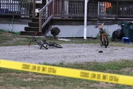 Abington, MA - 8/31/2016 - 2 bicycles at the scene at 159 Linwood Street in Abington where a 11 year old boy was injured in an apparent accidental shooting. - (Barry Chin/Globe Staff), Section: Metro, Reporter: Travis Anderson, Topic: 01Abington Shooting, LOID:
