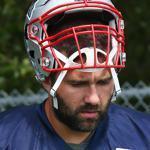 New England Patriots defensive end Rob Ninkovich (50) runs with the ball during an NFL football training camp practice Monday, Aug. 1, 2016, in Foxborough, Mass. (AP Photo/Steven Senne)