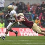 DUBLIN, IRELAND - SEPTEMBER 03: Justin Thomas of Georgia Tech is tackled by Connor Strachan of Boston College during the Aer Lingus College Football Classic Ireland 2016 at Aviva Stadium on September 3, 2016 in Dublin, Ireland. (Photo by Patrick Bolger/Getty Images)