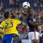 Sep 3, 2016; Foxborough, MA, USA; New England Revolution forward Juan Agudelo (17) heads the ball away from Colorado Rapids defender Bobby Burling (23) during the first half at Gillette Stadium. Mandatory Credit: Winslow Townson-USA TODAY Sports