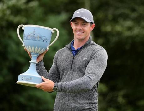 Norton MA 9/5/16 Rory McIlroy holding up the trophy after winning the Deutsche Bank Championships at the TPC Boston on Monday September 5, 2016. (Photo by Matthew J. Lee/Globe staff) 
