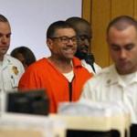 Sept 7, 2016 - New Bedord, MA - Walter DaSilva,45, smiles as he enters New Bedford District .courtroom for his arraignment for slaying his 19-year-old daughter, Sabrina DaSilva, 