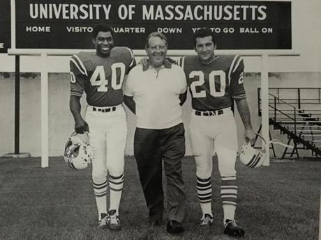 Larry Garron (left) and Gino Cappelletti flank the Patriots? first PR man, Gerry Moore, during a pre-season training camp in the early 1960s. 
