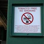 Boston, MA--3/31/2016--The new tobacco-free/no-smoking signs at Fenway Park are photographed, on Thursday March 31, 2016. Photo by Pat Greenhouse/Globe Staff Topic: 01chewing Reporter: Kay Lazar
