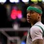 BOSTON, MA - APRIL 13: Isaiah Thomas #4 of the Boston Celtics looks on in the first quarter against the Miami Heat at TD Garden on April 13, 2016 in Boston, Massachusetts. NOTE TO USER: User expressly acknowledges and agrees that, by downloading and/or using this photograph, user is consenting to the terms and conditions of the Getty Images License Agreement. (Photo by Mike Lawrie/Getty Images)