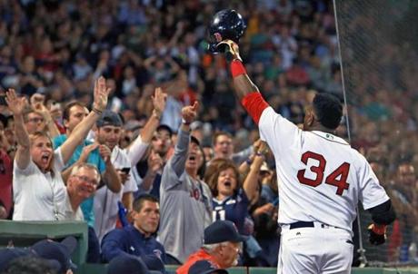 09/12/16: Boston, MA: Red Sox DH David Ortiz blasted a bottom of the sixth inning solo home run, the 536th of his career, which tied him with Mickey Mantle for 17th on the all time list. After he did he came out of the dugout for a curtaon call as the fans saluted him. The Boston Red Sox hosted the Baltimore Orioles in a regular season MLB baseball gamut Fenway Park. (Globe Staff Photo/Jim Davis) section: metro topic: Red Sox-Orioles 
