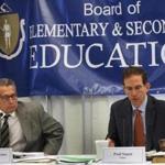 Commissioner Mitchell D. Chester & Chair Paul Sagan during a meeting of the Board of Elementary and Secondary Education in Malden last year.