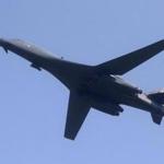 One of the two B-1B Lancer bombers deployed by the US military flies over Osan Air Base in Pyeongtaek, South Korea,  on Tuesday.