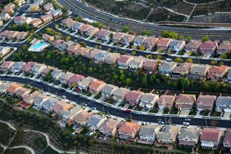 FILE -- A housing development in Santa Clarita, Calif., Dec. 19, 2014. For American families, household incomes rose strongly in 2015, breaking a years-long pattern of income stagnation. The median householdÕs income in 2015 was $56,500, an increase of 5.2 percent over the previous year, the Census Bureau reported. (Monica Almeida/The New York Times)

