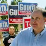 Incumbent U.S. Rep. Frank Guinta, R-N.H. greets voters at the polling station Tuesday, Sept. 13, 2016, in Manchester, N.H. Guinta is seeking re-election. Republican Rich Ashooh is trying to unseat Guinta in the state primary. New Hampshire voters are heading to the polls to choose nominees for governor, U.S. Senate and the U.S. House of Representatives. (AP Photo/Jim Cole)