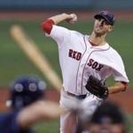Boston Red Sox starting pitcher Rick Porcello delivers against the Tampa Bay Rays during the first inning of a baseball game at Fenway Park, Monday, Aug. 29, 2016, in Boston. (AP Photo/Charles Krupa)