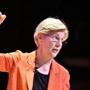 Senator Elizabeth Warren delivers her Power Point presentation on the 