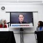 Edward Snowden, seen via satellite from Moscow, spoke during a press conference this week about a new campaign to persuade President Barack Obama to pardon him. 