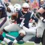 Foxborough, MA 9/18/16 Patriots Jacoby Brissett gets tackled by a Dolphins defender in the third quarter at Gillette Stadium. (Jim Davis/Globe Staff)
