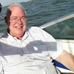 info from Beth Healy: A photo of Scott Wolas, aka Eugene Grathwohl, provided to the police by one of his alleged victims. He is pictured here on a boat, earlier this year. ( NO CREDIT ) DO NOT Redistribute 
