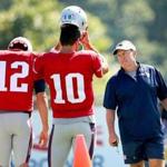 Foxborough- 8/3/2016- The New England Patriots practiced at their training camp at Gillette Stadium. Coach Bill Belichick chats with QB's Tom Brady and Jimmy Garoppolo. Boston Globe staff photo by John Tlumacki(sports)
