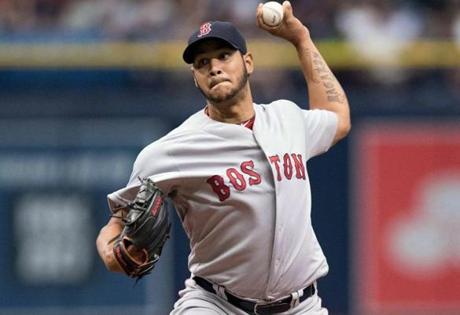 Sep 25, 2016; St. Petersburg, FL, USA; Boston Red Sox starting pitcher Eduardo Rodriguez (52) delivers a pitch against the Tampa Bay Rays at Tropicana Field. Mandatory Credit: Jeff Griffith-USA TODAY Sports
