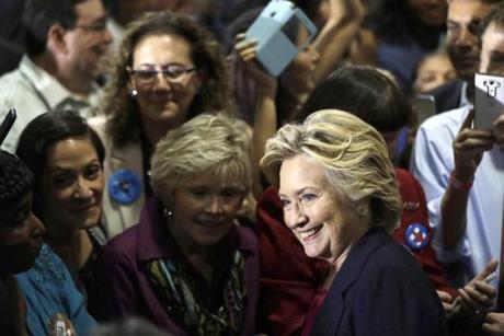 Democratic presidential candidate Hillary Clinton meets with attendees during a campaign stop at Wake Technical Community College in Raleigh, N.C., Tuesday, Sept. 27, 2016. (AP Photo/Matt Rourke)
