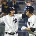 Jacoby Ellsbury (left) congratulated catcher Gary Sanchez on his two-run home run in the first inning.