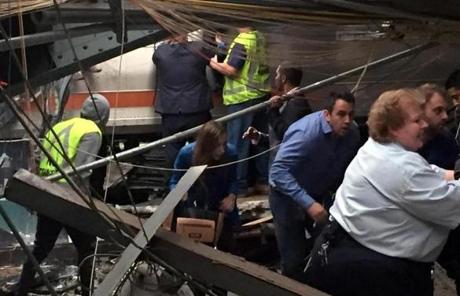 HOBOKEN, NJ - SEPTEMBER 29: Passengers rush to safety after a NJ Transit train crashed in to the platform at the Hoboken Terminal September 29, 2016 in Hoboken, New Jersey. (Photo by Pancho Bernasconi/Getty Images)
